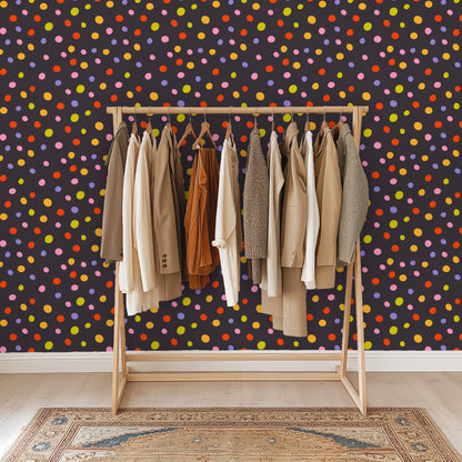 Pattern close-up showing hand-drawn dot shapes and the energetic, even distribution across the dark field