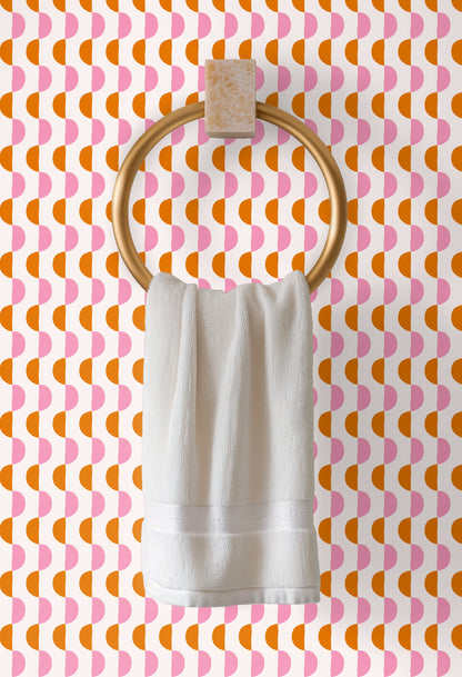 Detail image emphasizing the vertical columns of alternating pink and terracotta half‑moons in the repeat.