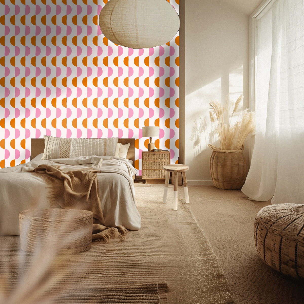 Nursery with a light wood crib and the semicircle wallpaper above wainscoting, pink and orange half‑moons creating a playful stripe.