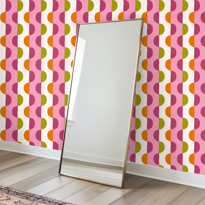 Playroom wall dressed in Blossom Arc Stripe wallpaper with an arched window and children's storage, demonstrating a lively, kid-friendly use
