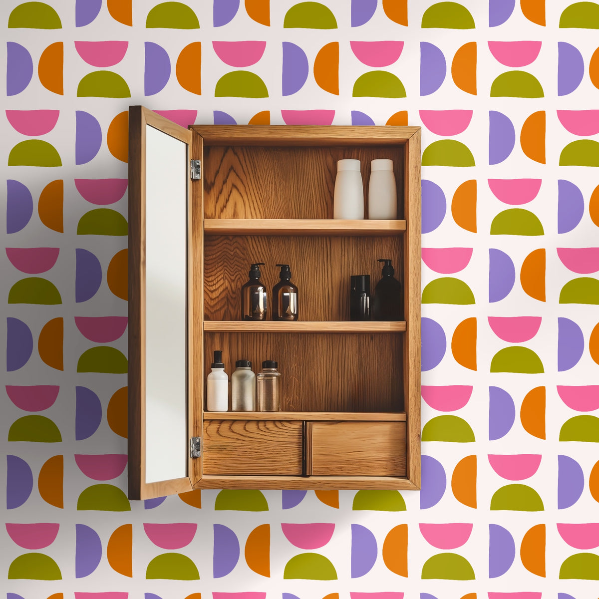 Open wooden medicine cabinet mounted on the patterned wall, showing alignment of the small repeat around bathroom fixtures.