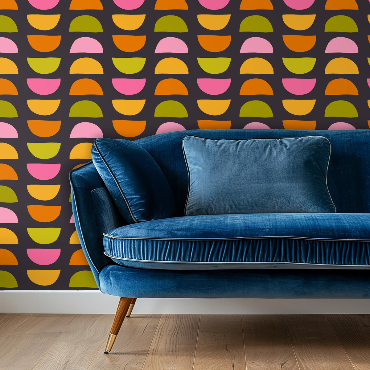 Entry vignette with console and framed art against the bold charcoal wallpaper patterned with colorful half-moons.
