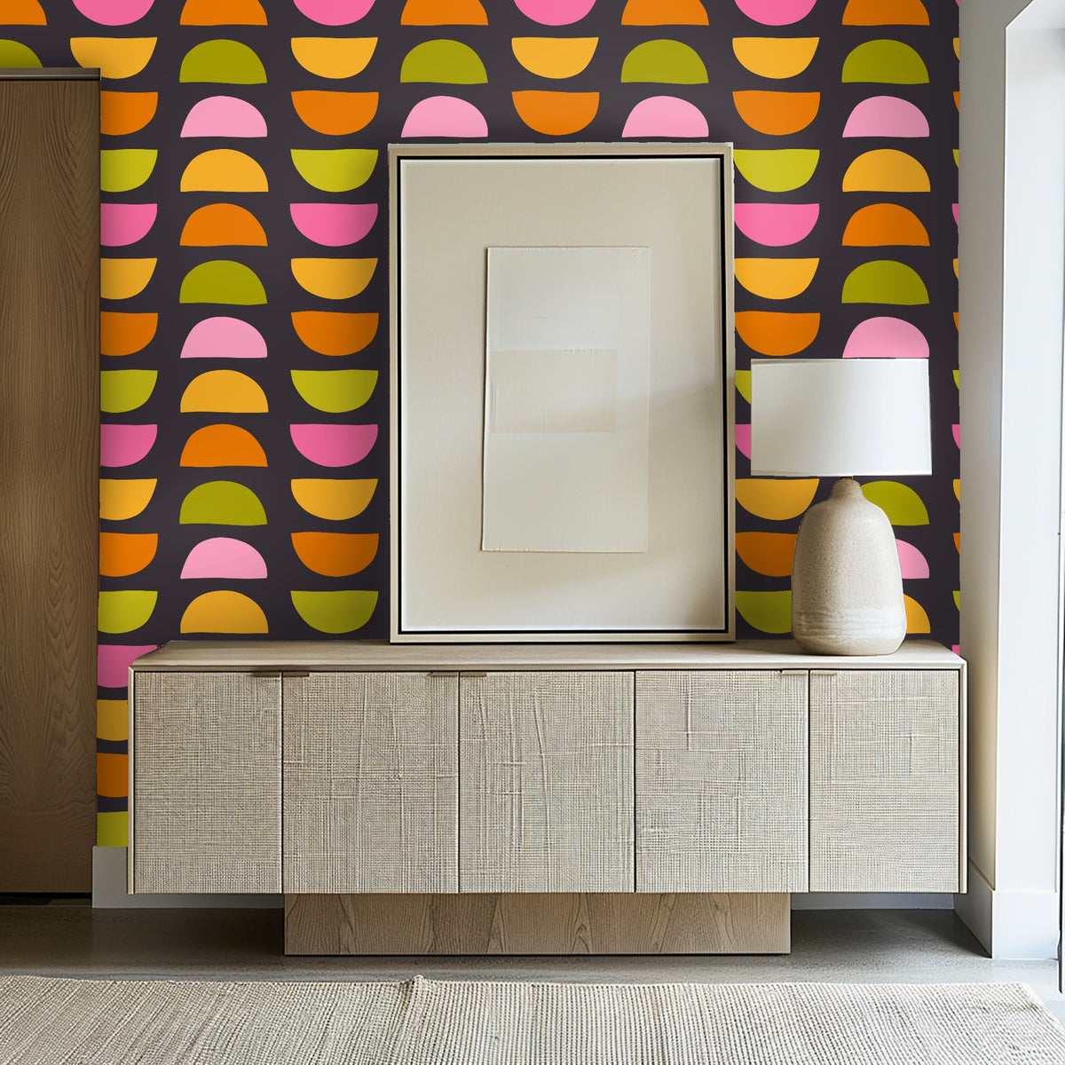 Bedroom with vaulted ceiling showing the Half‑Moon Chorus wallpaper as the bed’s focal wall, pattern tiled vertically between windows.