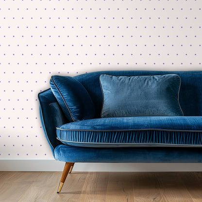 Blue velvet sofa set in front of the dotted wallpaper illustrating dot scale and contrast