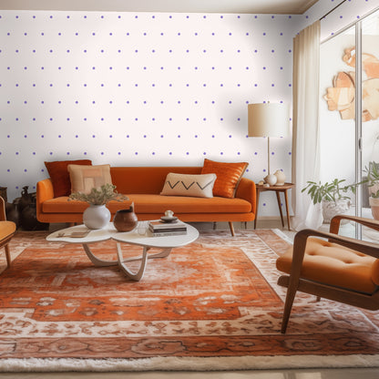 Full-wall view highlighting delicate lavender dots across a pale blush wall in a living space