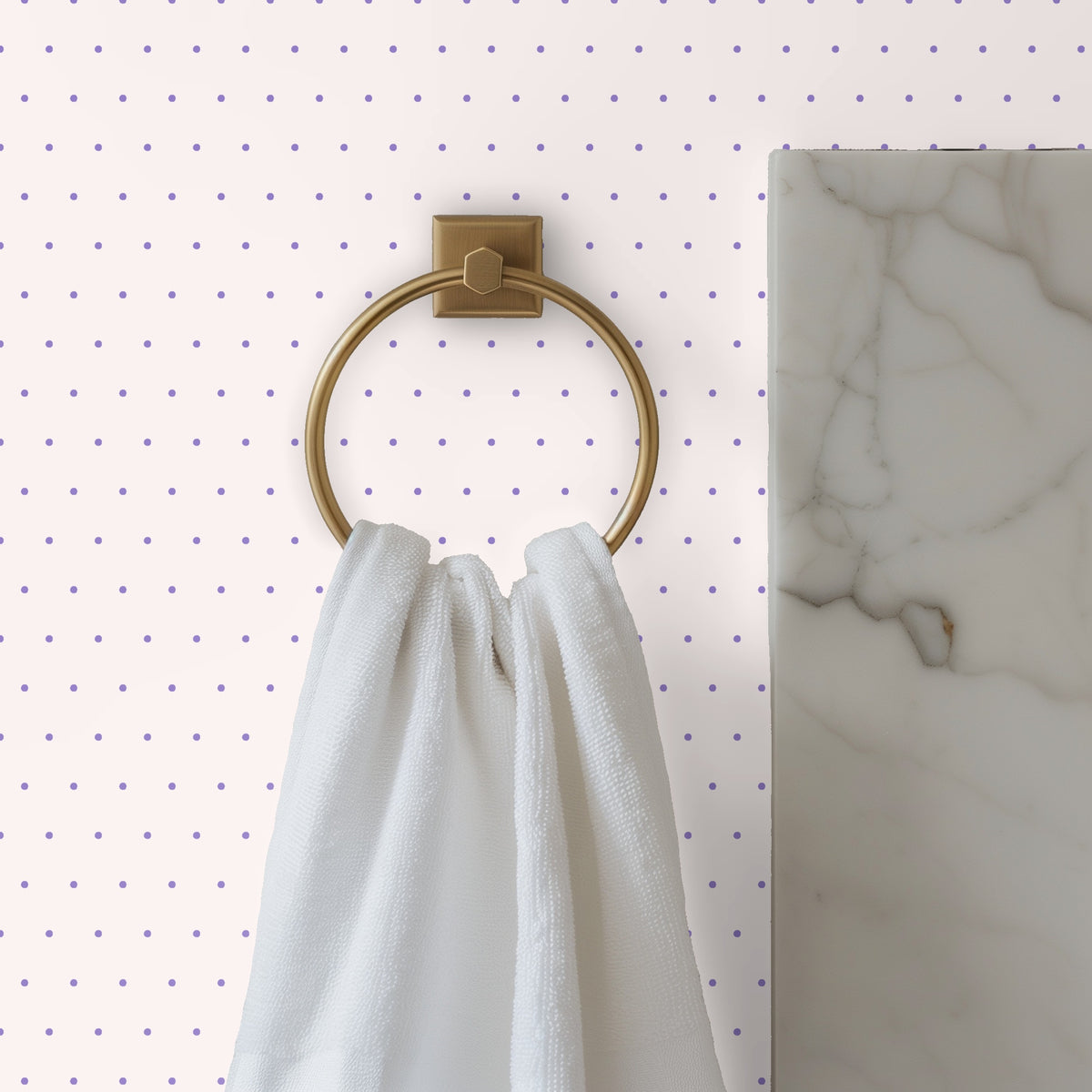 Low wooden bench with three stuffed animals in front of the polka-dot wallpaper suggesting nursery styling