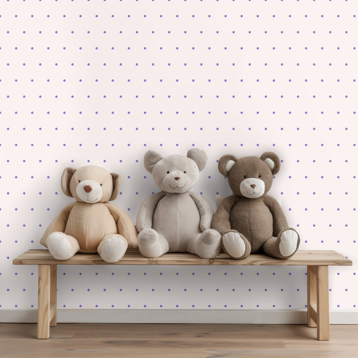 Close-up of pattern showing pale blush background with evenly spaced lilac polka dots