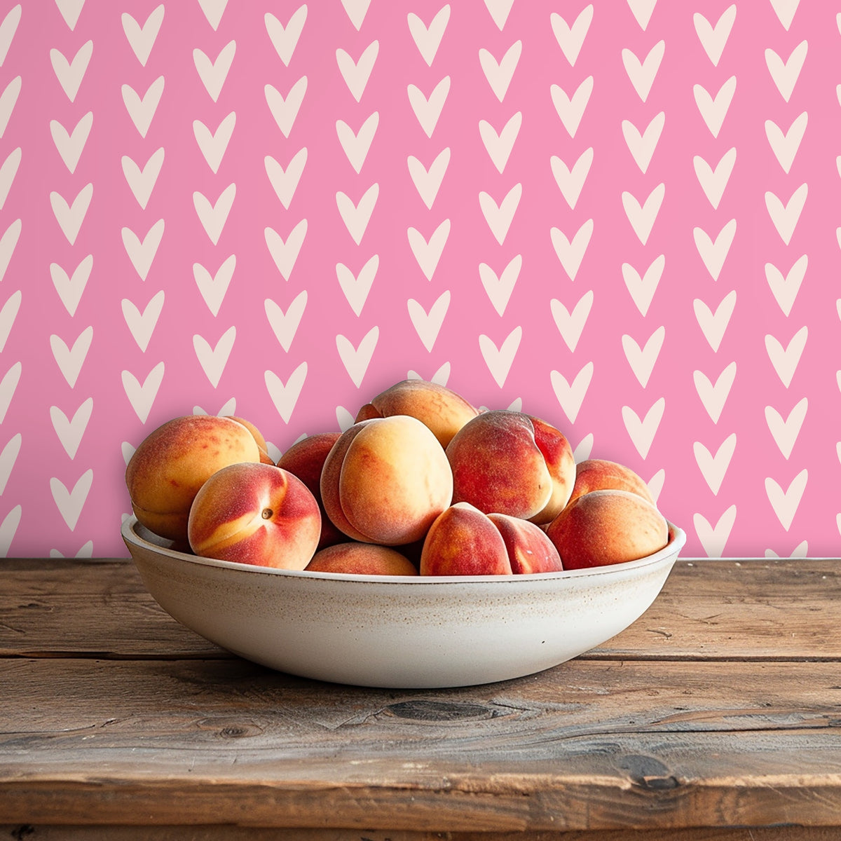 Close-up of the Rose & Ivory Hearts pattern showing large, hand-drawn cream hearts on a bubblegum pink background.