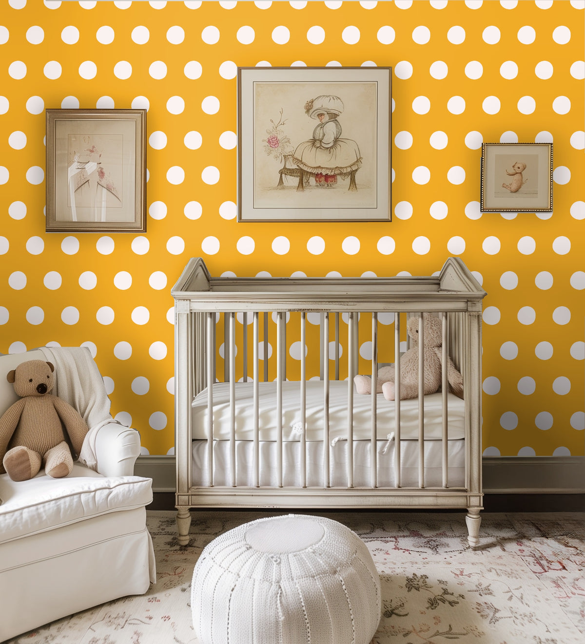 Nursery scene with a crib against the marigold polka wall, framed prints and soft textiles.