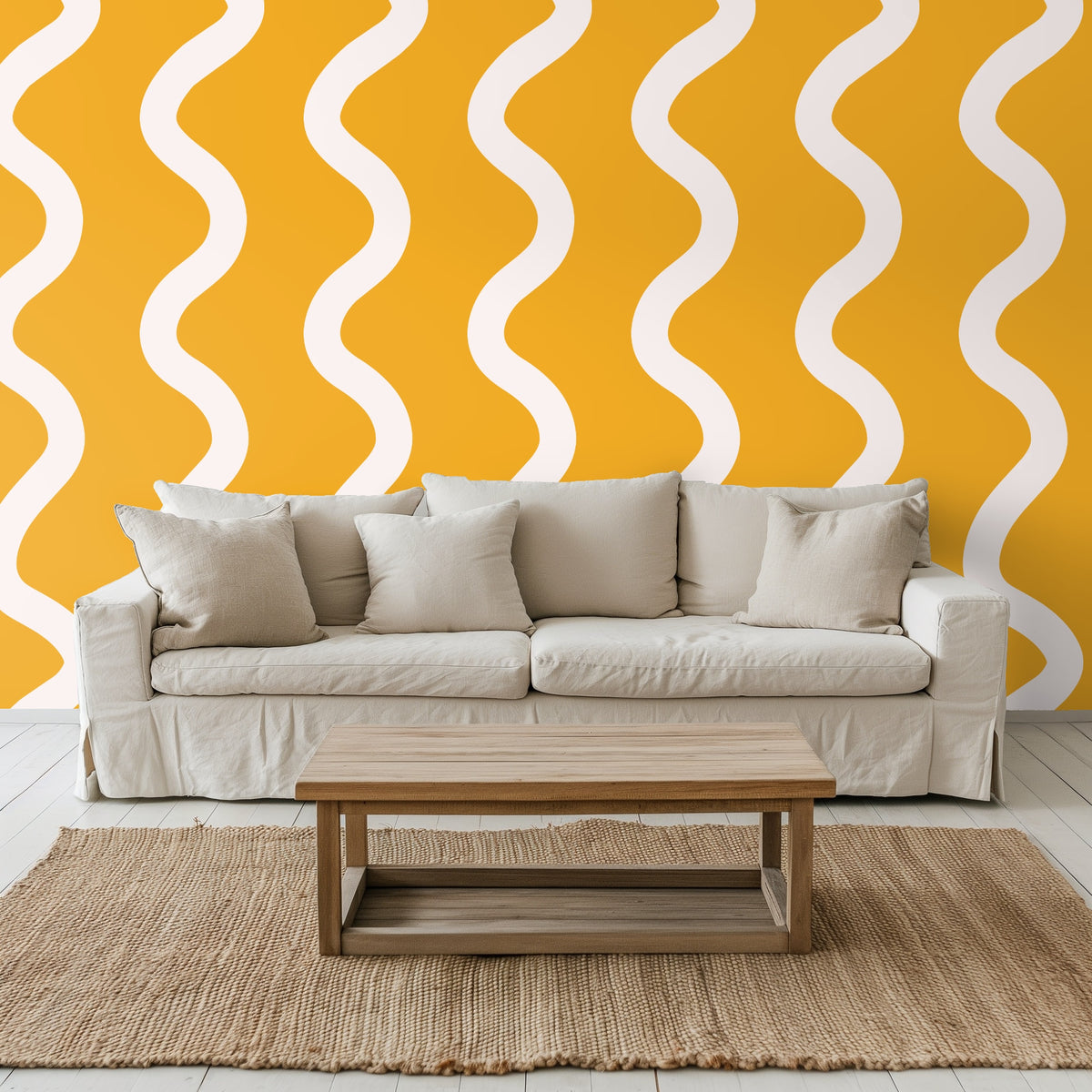 Living room view with a neutral sofa placed against the saffron and cream wavy stripe wallpaper