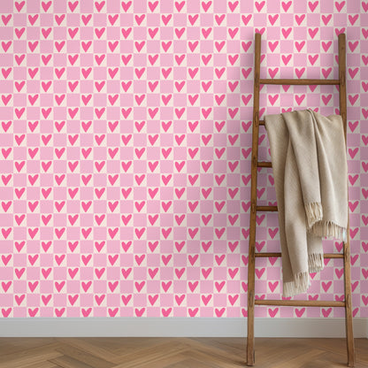 Detail of small-scale repeat across a wall with a wooden ladder and folded cream blanket
