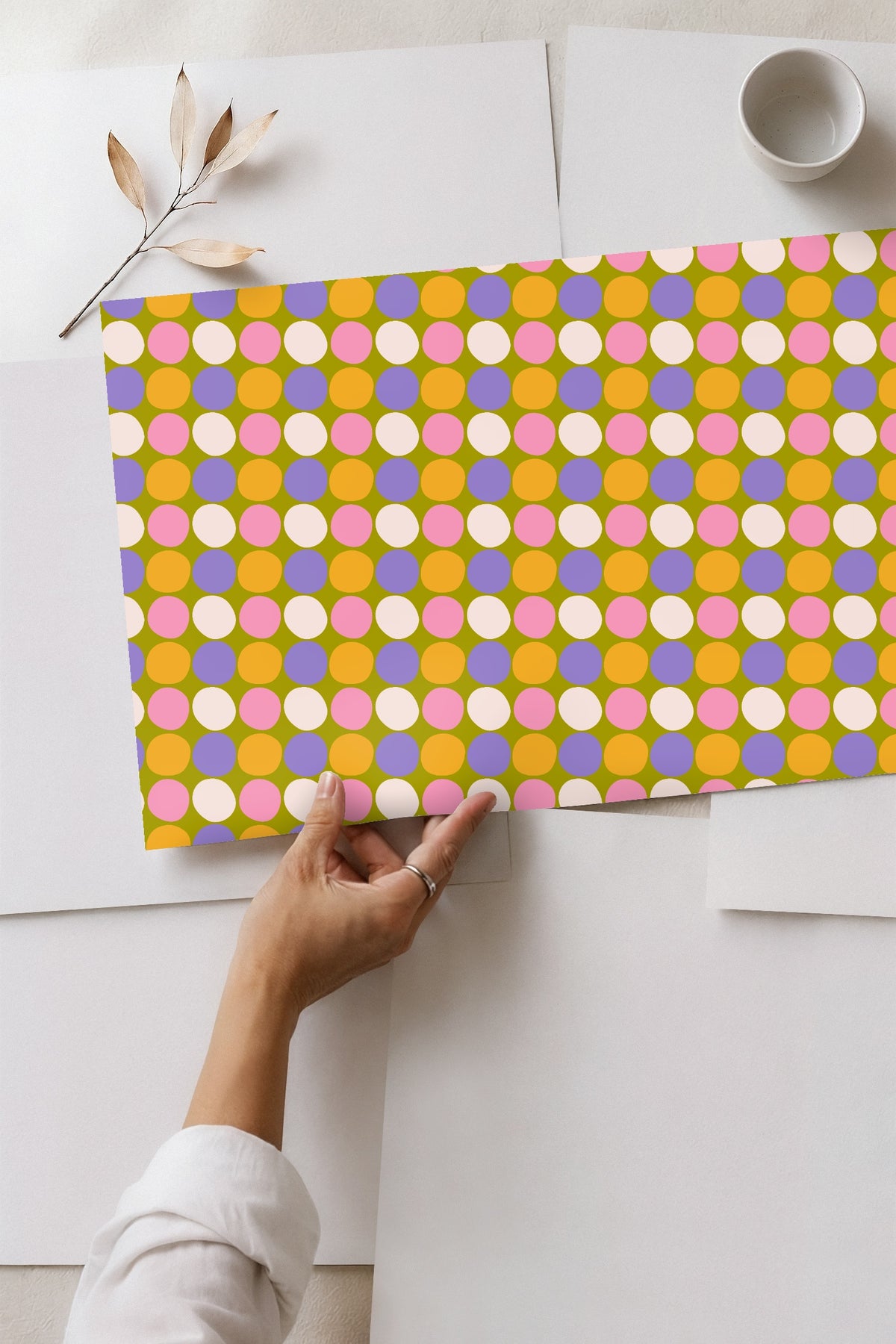 Wide shot of the wallpaper repeating wall-to-wall, showing pattern scale in a domestic interior
