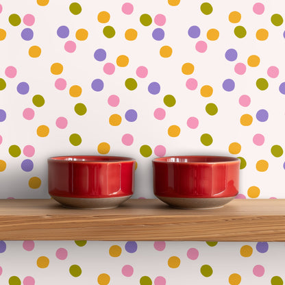 Detail view of wallpaper behind a wooden shelf and window above a sink, showing the pattern scale