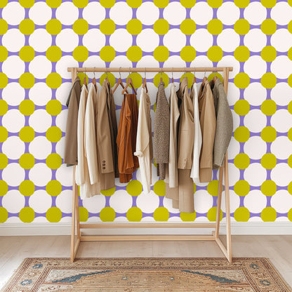 Entryway vignette with console and lamp in front of the graphic chartreuse and lilac repeat