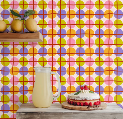 Playroom lined with Orbit Lattice wallpaper that brings bright, playful color and rhythm to a child's space.