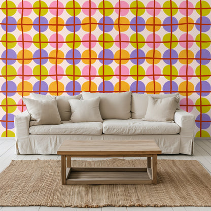 Close-up of the Orbit Lattice pattern showing ovoid circles in pink, chartreuse, lilac and orange with a hand-drawn rust-red grid on a pale-