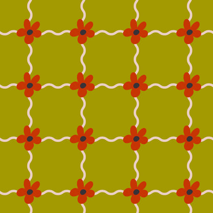 Styled vignette of Marigold Lattice wallpaper in an entry niche with a bench and textile cushion