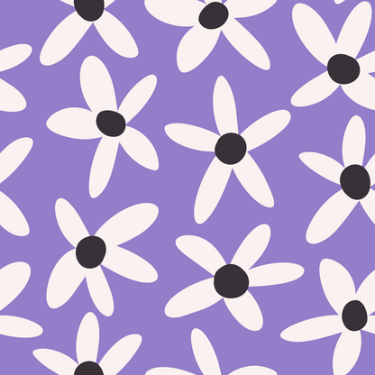 Tight detail of charcoal flower center and surrounding cream petals on a lilac field