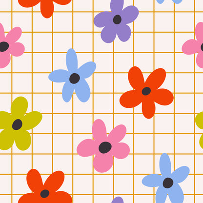 Close perspective of the pattern centered on several petals and a charcoal flower center over the mustard grid