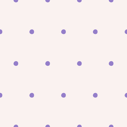 Detail view focusing on individual lilac dots and the subtle blush field behind them